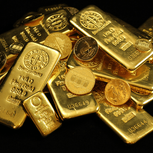 A pile of gold bars and coins on a black background
