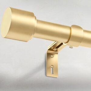 Close-up of a sleek gold curtain rod with a sturdy wall-mounted bracket, featuring a smooth metallic finish and minimalist design.