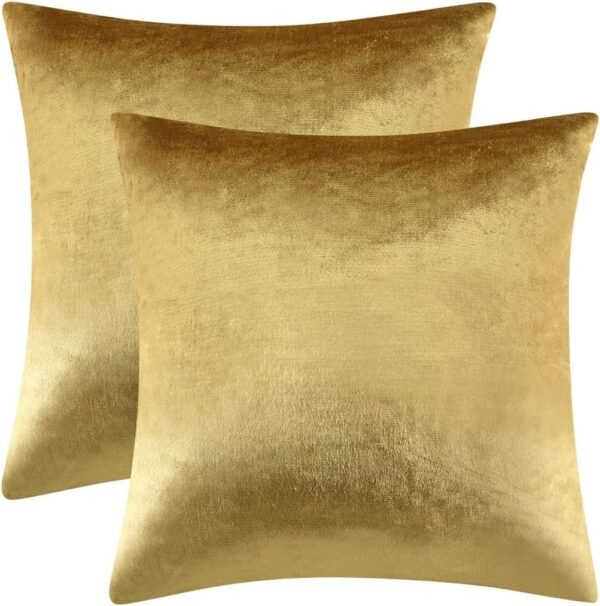 Set of two gold velvet decorative throw pillow covers with a soft, luxurious texture, perfect for enhancing the elegance of sofas, beds, or chairs.